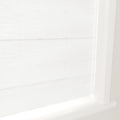 White fabric Roman shades with subtle texture and clean horizontal folds, installed in a bright white window frame and sill