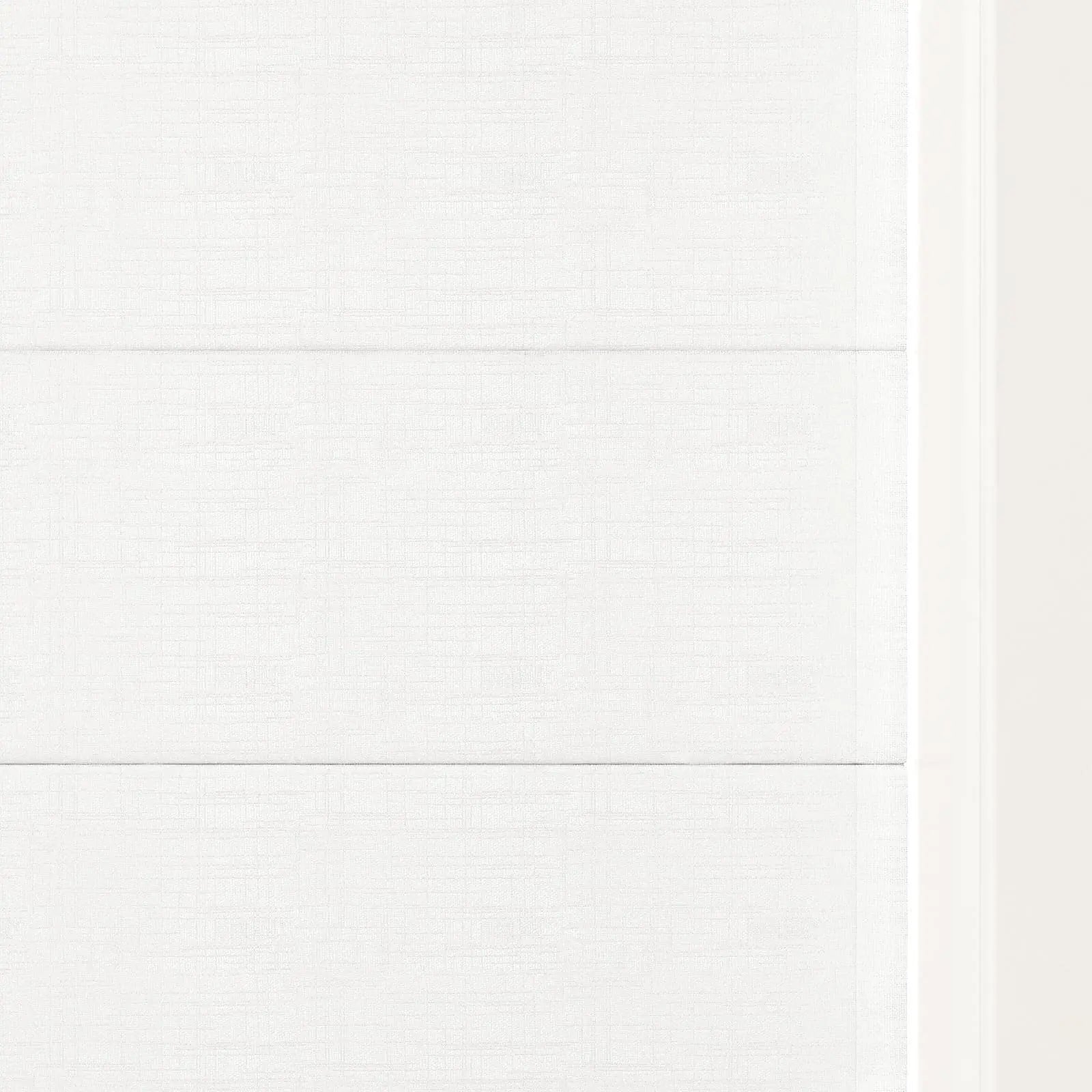 Photograph of an off-white textured fabric showcasing subtle horizontal folds and a fine woven grid pattern beside a clean vertical white frame