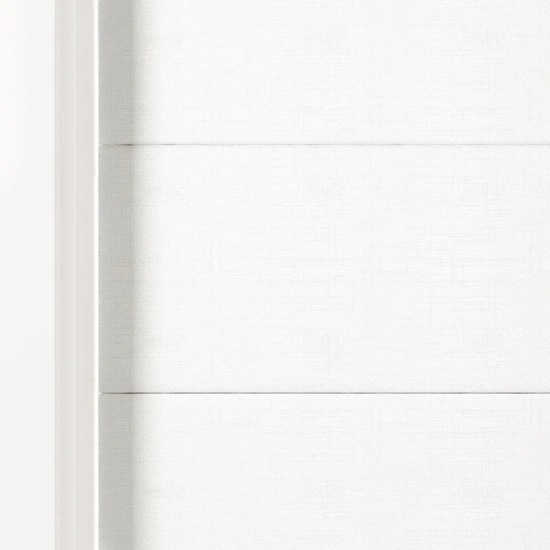 Photograph of a minimalist white woven texture with faint horizontal creases and a soft shadow along a smooth left border