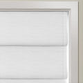 White textured Roman shades partially lowered on an interior window with a crisp white frame showcasing neat horizontal fabric folds