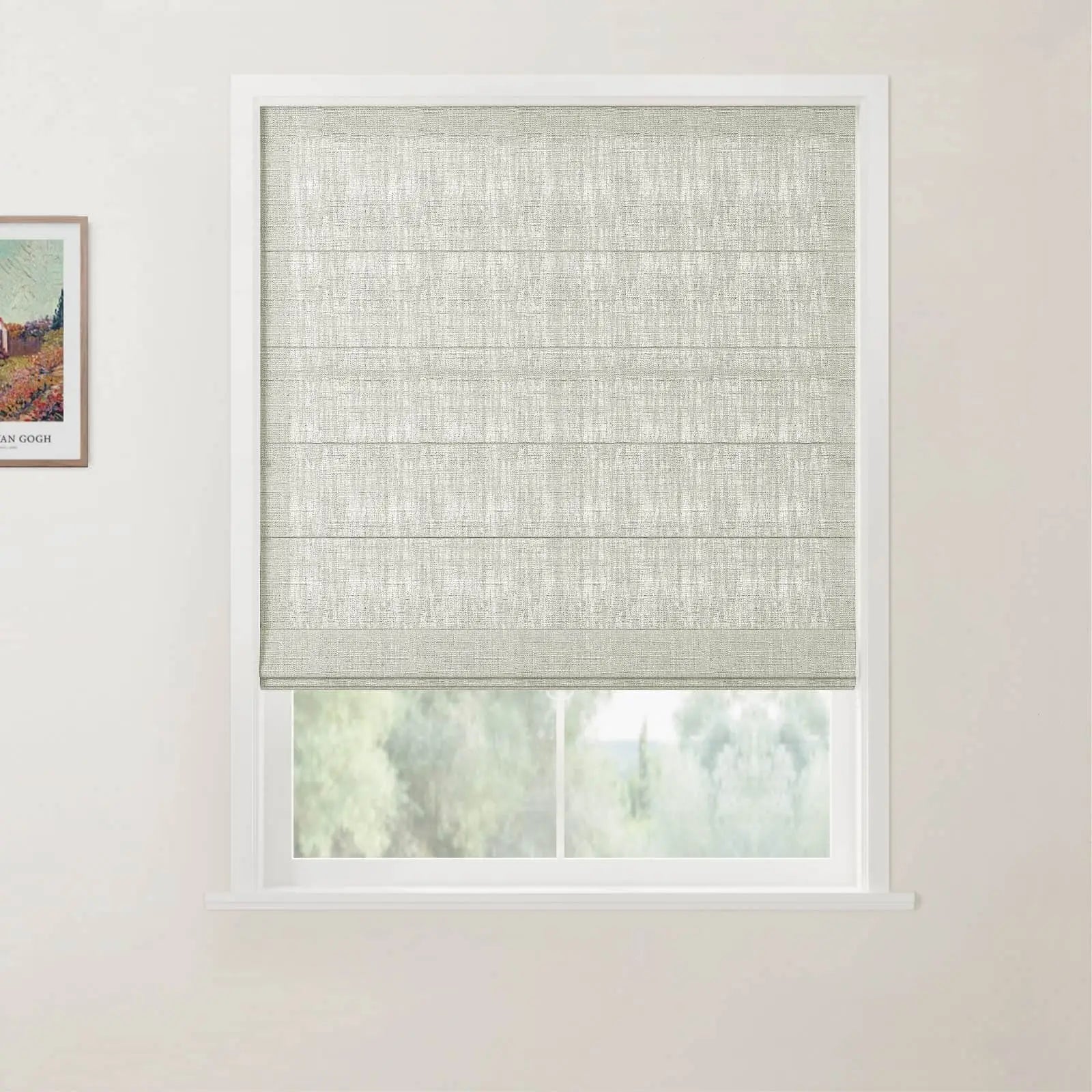 An interior scene featuring a white window frame with a light grey textured Roman blind, partially lowered to reveal green outdoor foliage, and a framed Van Gogh landscape print on the left wall depicting colorful fields and a small house