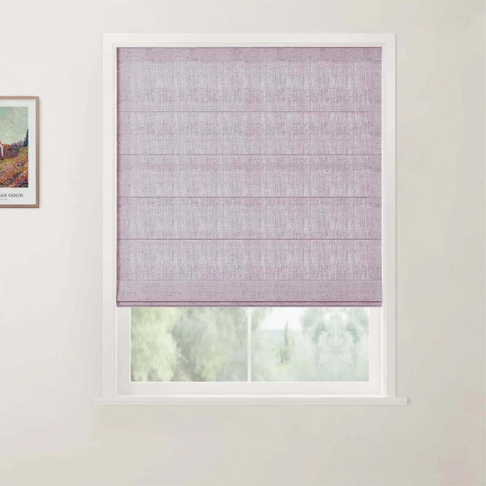 A framed Van Gogh landscape print positioned beside a textured lavender Roman blind on a white-framed window in an interior photograph overlooking blurred green outdoor foliage