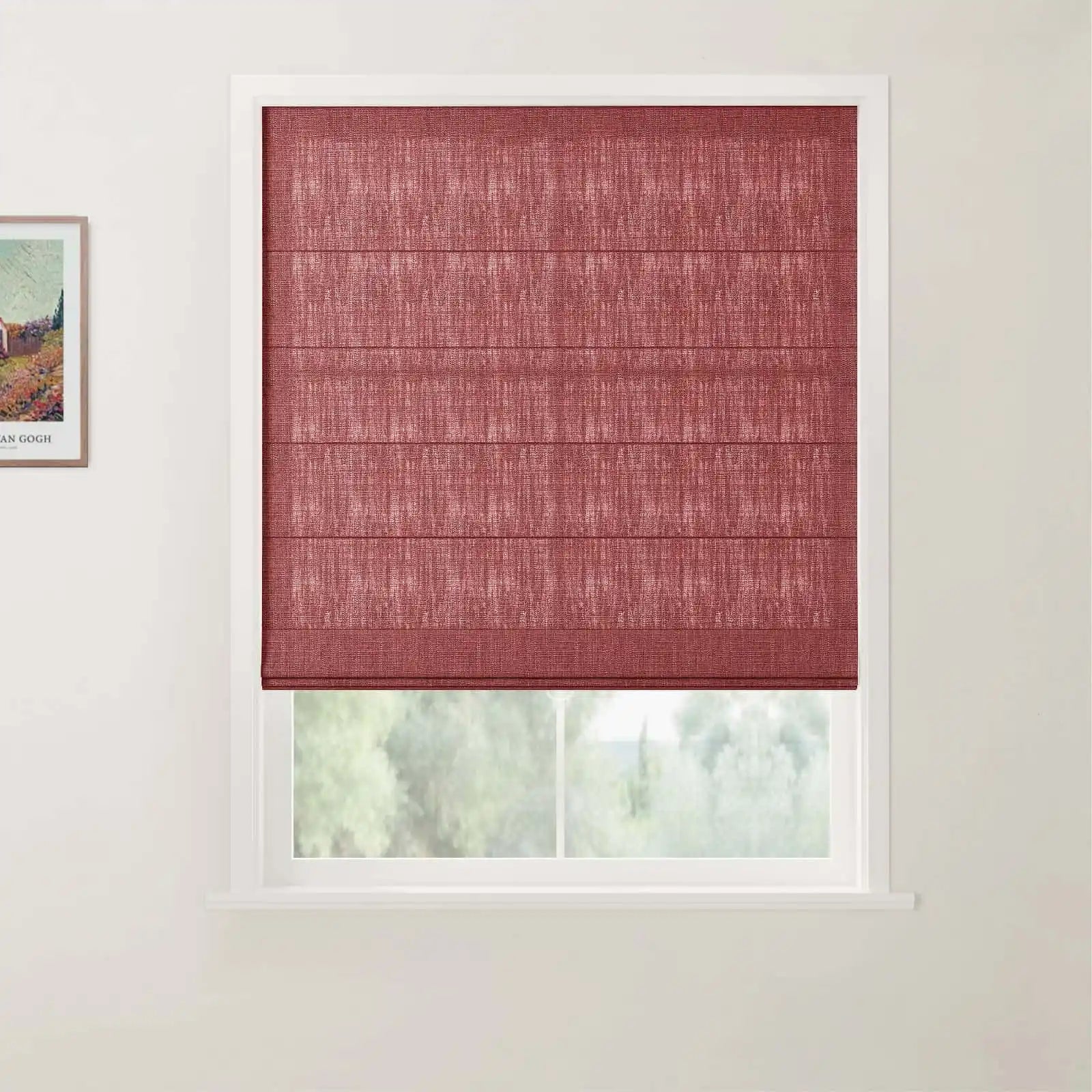 A photograph of an indoor window featuring a deep red textured Roman blind, a white frame, and a framed Van Gogh landscape print on the adjacent wall