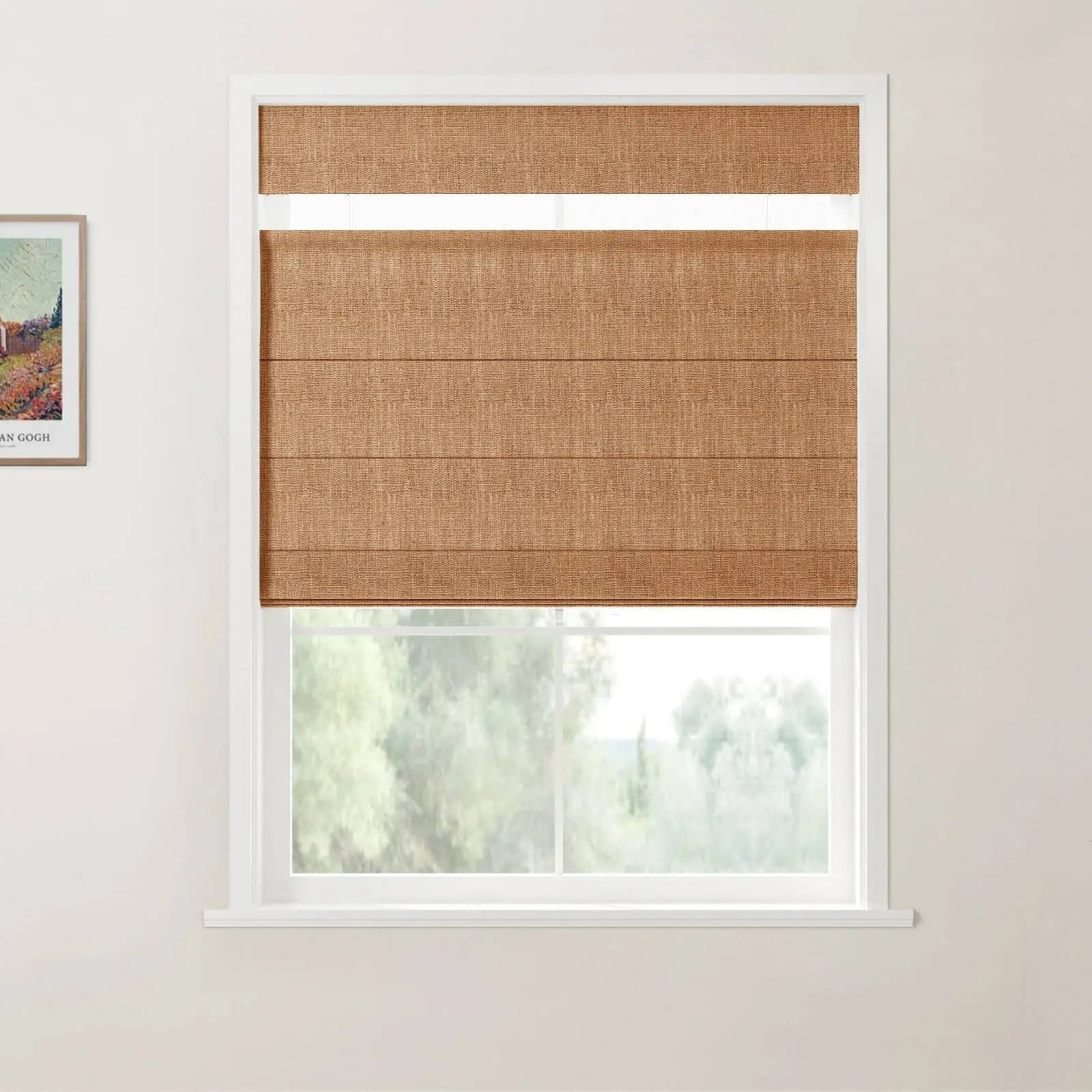 Photograph featuring a framed Van Gogh landscape print beside a window with a partially raised textured light brown Roman blind revealing a white slat and a blurred green outdoor view