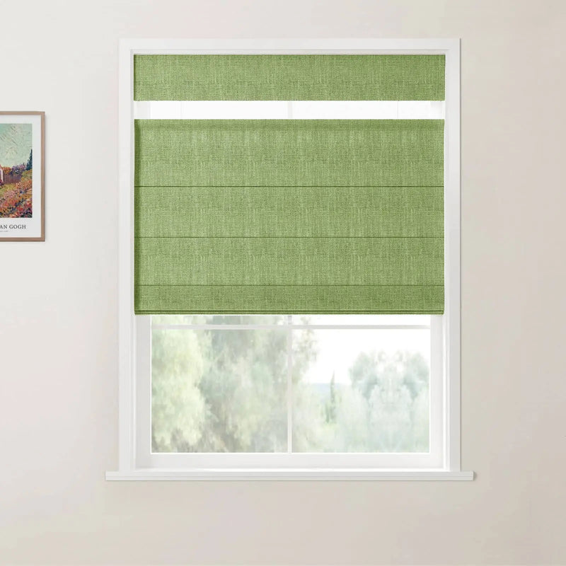 Photograph with a framed Van Gogh print, depicting a modern window featuring a vibrant green textured Roman blind with a white sheer top band, overlooking a blurred natural landscape from an interior room