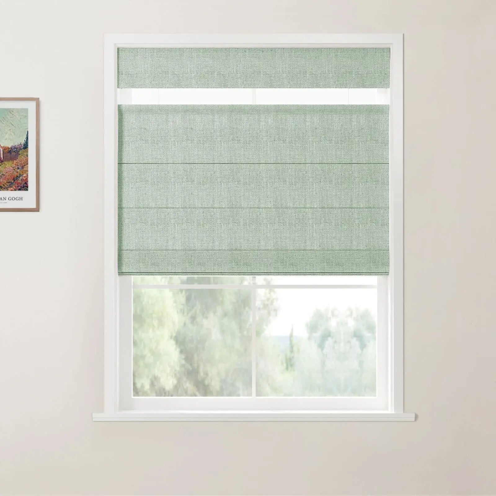 Photograph, an interior room features a window with sage green textured Roman blinds and a white frame, overlooking a blurred natural landscape, with a framed Van Gogh art print on the adjacent light wall