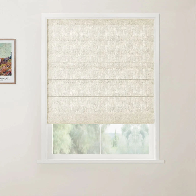 Photograph of a window in an interior room featuring a light beige linen-textured Roman blind with horizontal folds, a colorful Van Gogh landscape print on the left wall, and soft green foliage visible outside