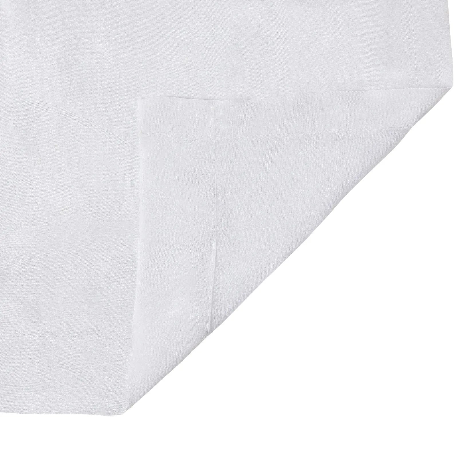 Plain white fabric featuring a subtle woven texture, neatly folded diagonally in the bottom right corner revealing a distinct stitched hemline