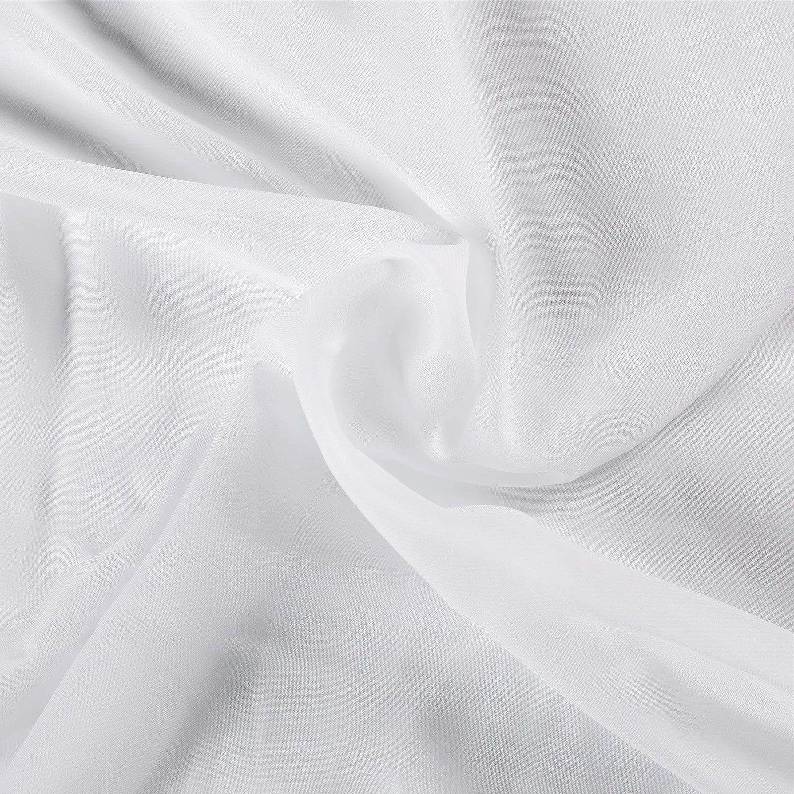 White sheer fabric with gentle folds and a delicate texture creating subtle shadows