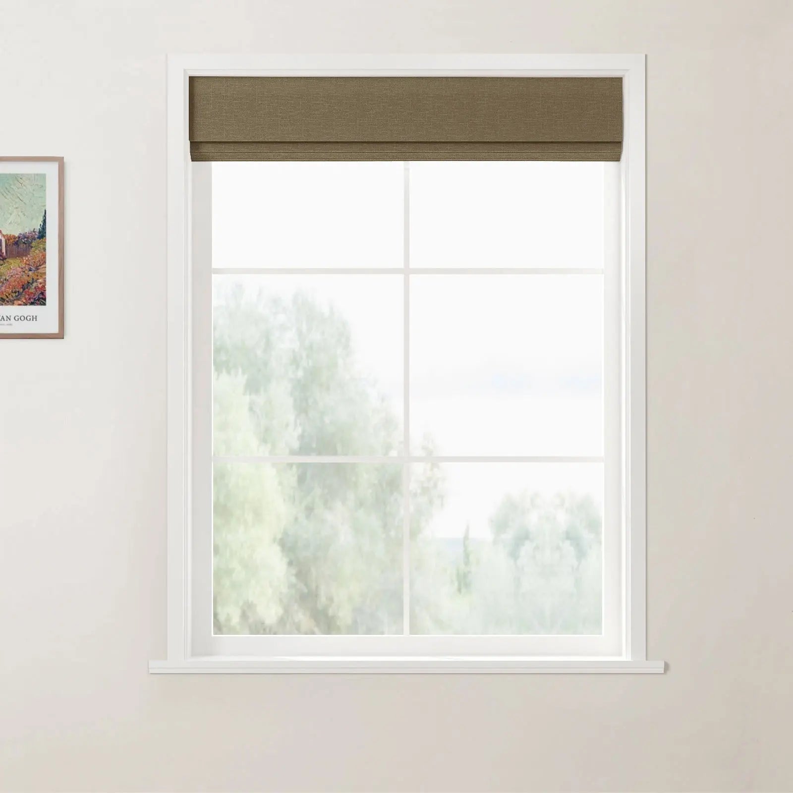 Photograph of a white multi-pane window with a brown Roman blind and a framed Van Gogh art print on a light beige wall looking out to misty green trees