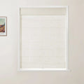 Photograph of an interior room featuring a window with a beige textured Roman blind, white trim, and a partial view of a framed Van Gogh landscape print