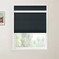 Photograph of a contemporary interior featuring a dark grey layered zebra blind on a white-framed window, with a framed Van Gogh print on the light cream wall and blurred green foliage outside