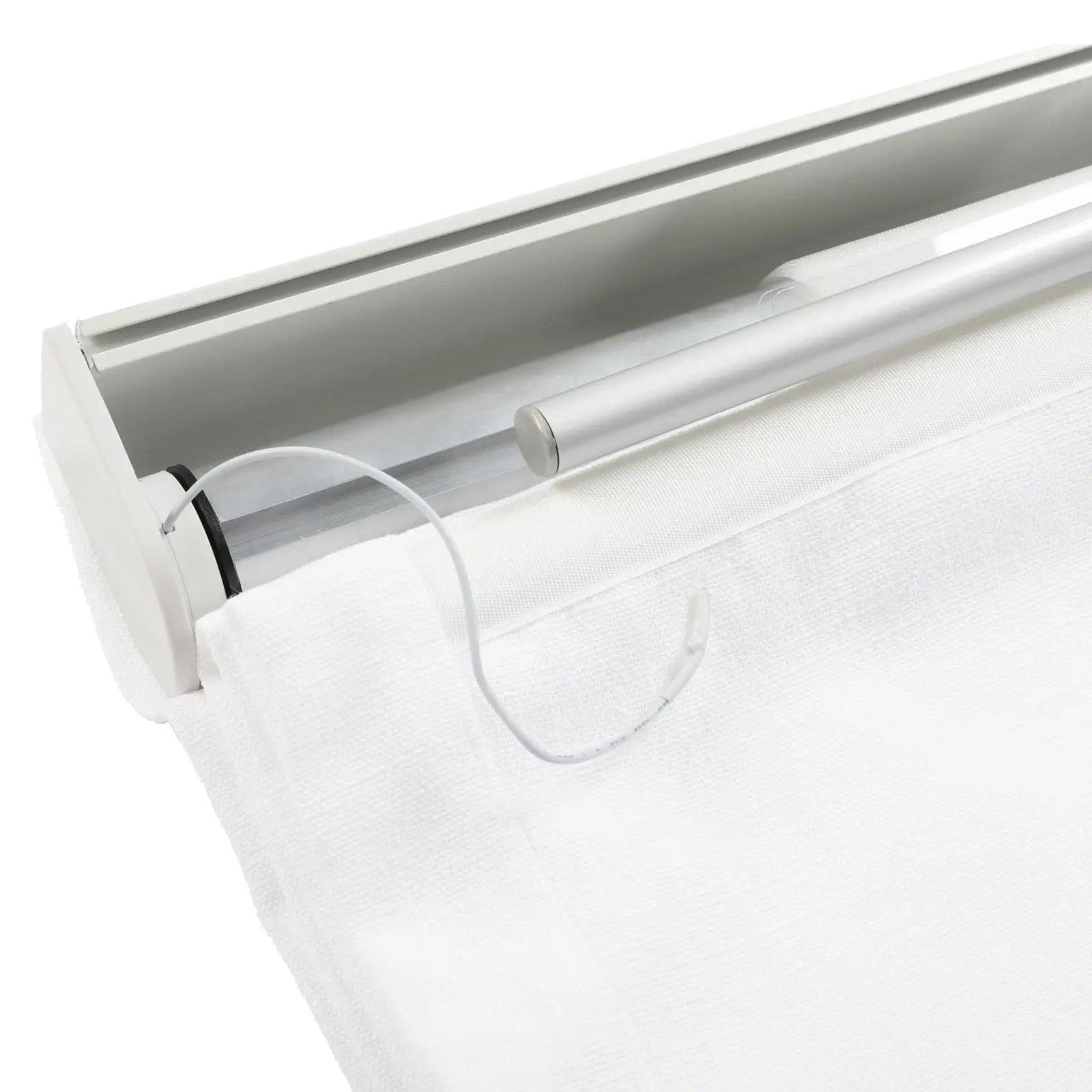 Close-up of a modern white textured roller blind mechanism with a silver aluminum housing and a thin white control cord showing a black end cap