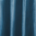 Digital photograph of deep teal fabric featuring subtle vertical folds and a finely textured weave