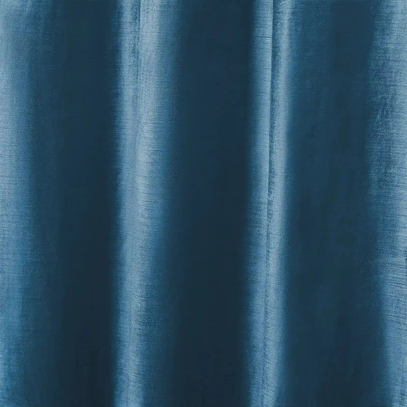 Digital photograph of deep teal fabric featuring subtle vertical folds and a finely textured weave