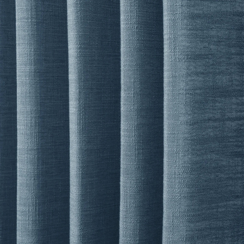 Aegean Blue Liz linen curtains in a close room detail highlighting the linen texture and colour