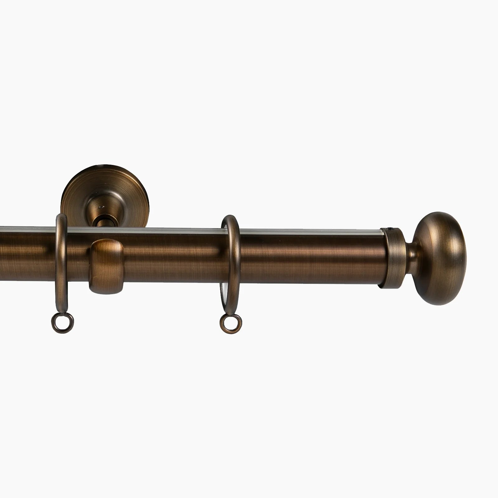 A brushed bronze double curtain pole featuring a clear acrylic inner pole and a rounded finial