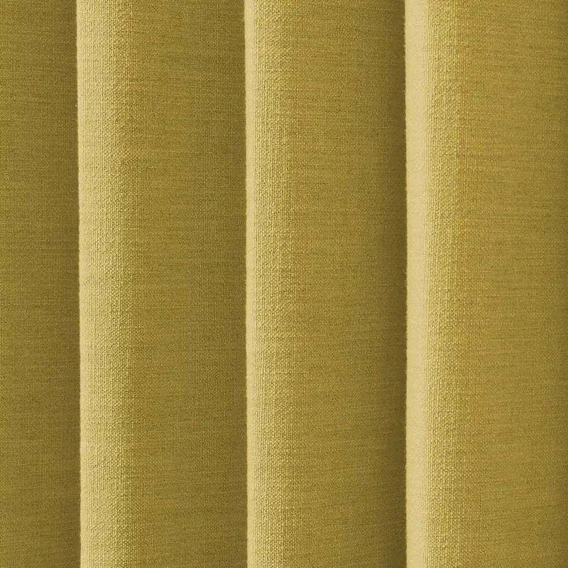 Photograph of an olive green fabric with a coarse woven texture and deep vertical pleats showing light and shadow play