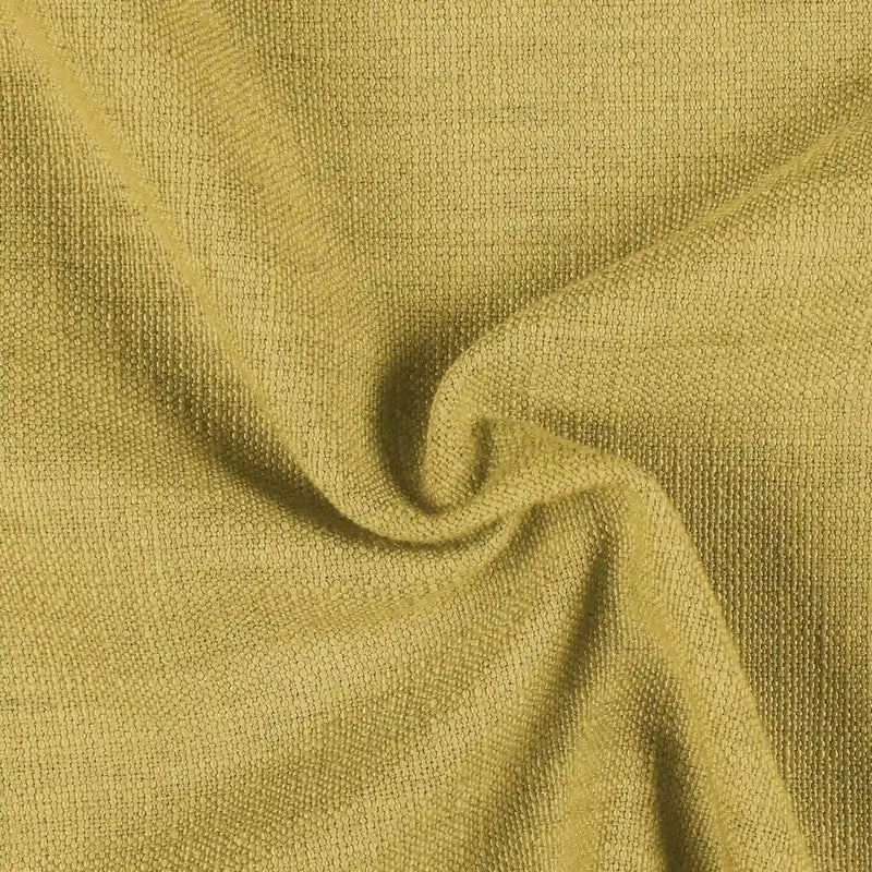 Photograph of a muted chartreuse-colored woven fabric displaying a distinct nubby texture and soft, natural drapes