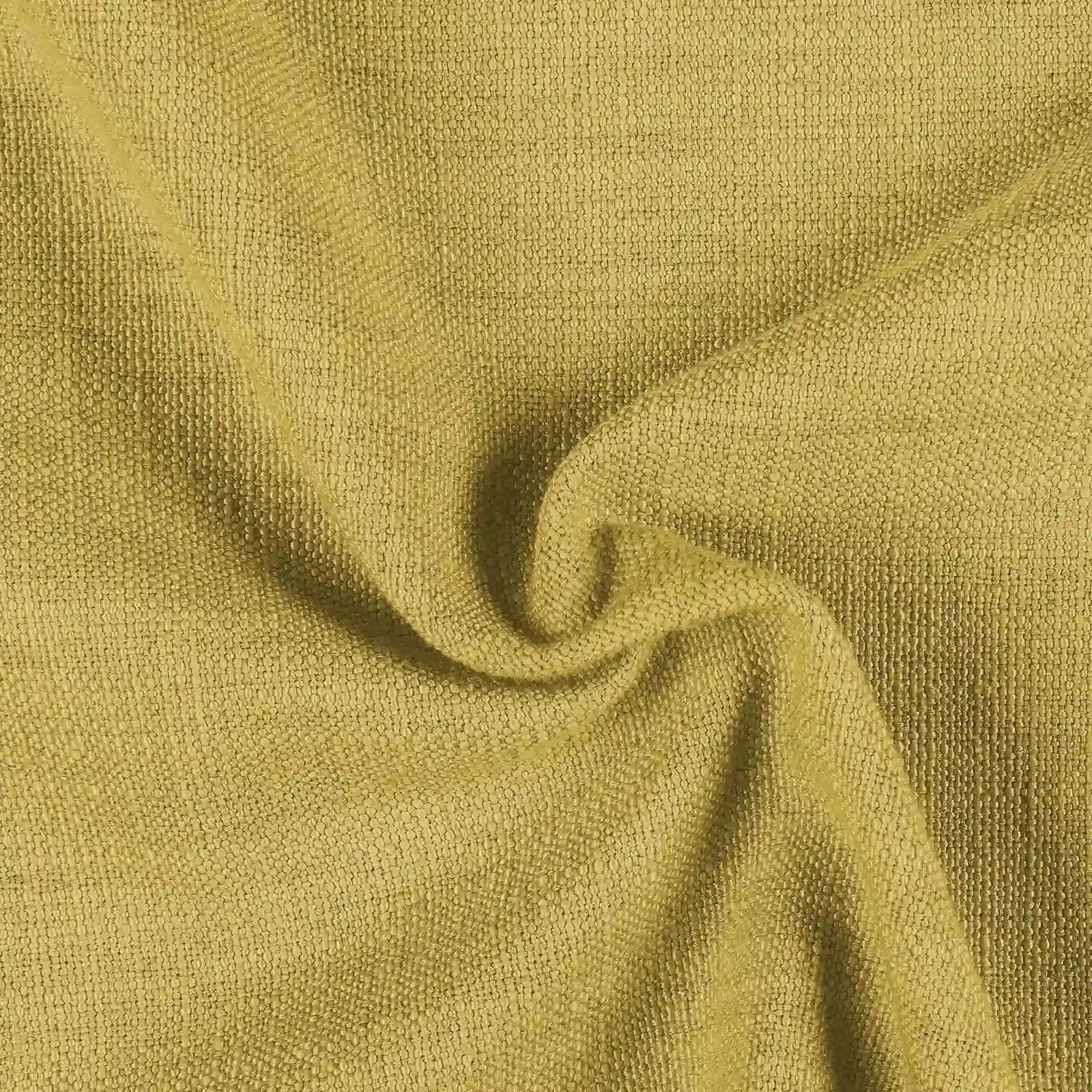 Photograph of a muted chartreuse-colored woven fabric displaying a distinct nubby texture and soft, natural drapes