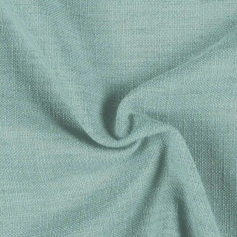 Mint green textured fabric with a bouclé-like weave draped in soft folds and subtle shadows