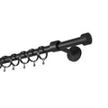 Matte black metal curtain pole with matching rings and small S-hooks, featuring a sleek cylindrical finial and wall-mounted bracket displayed against a pure white studio background