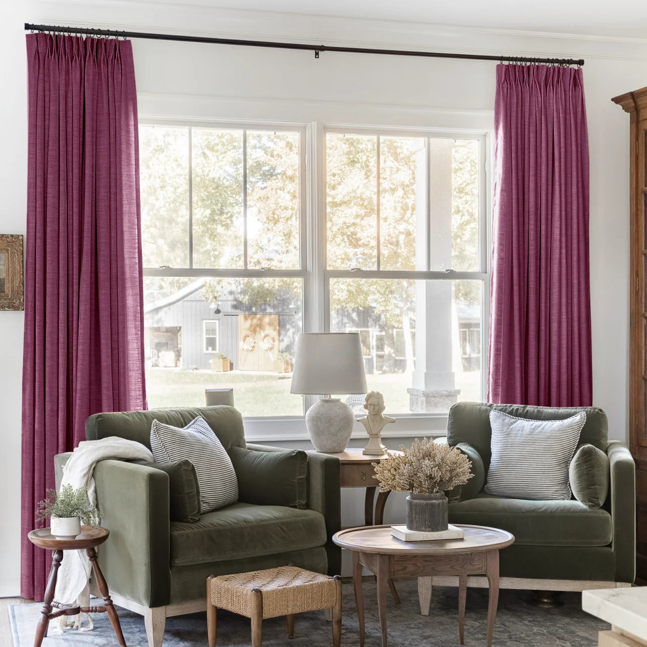 Burgundy Red Liz linen curtains framing a bright window in a balanced full-length interior view