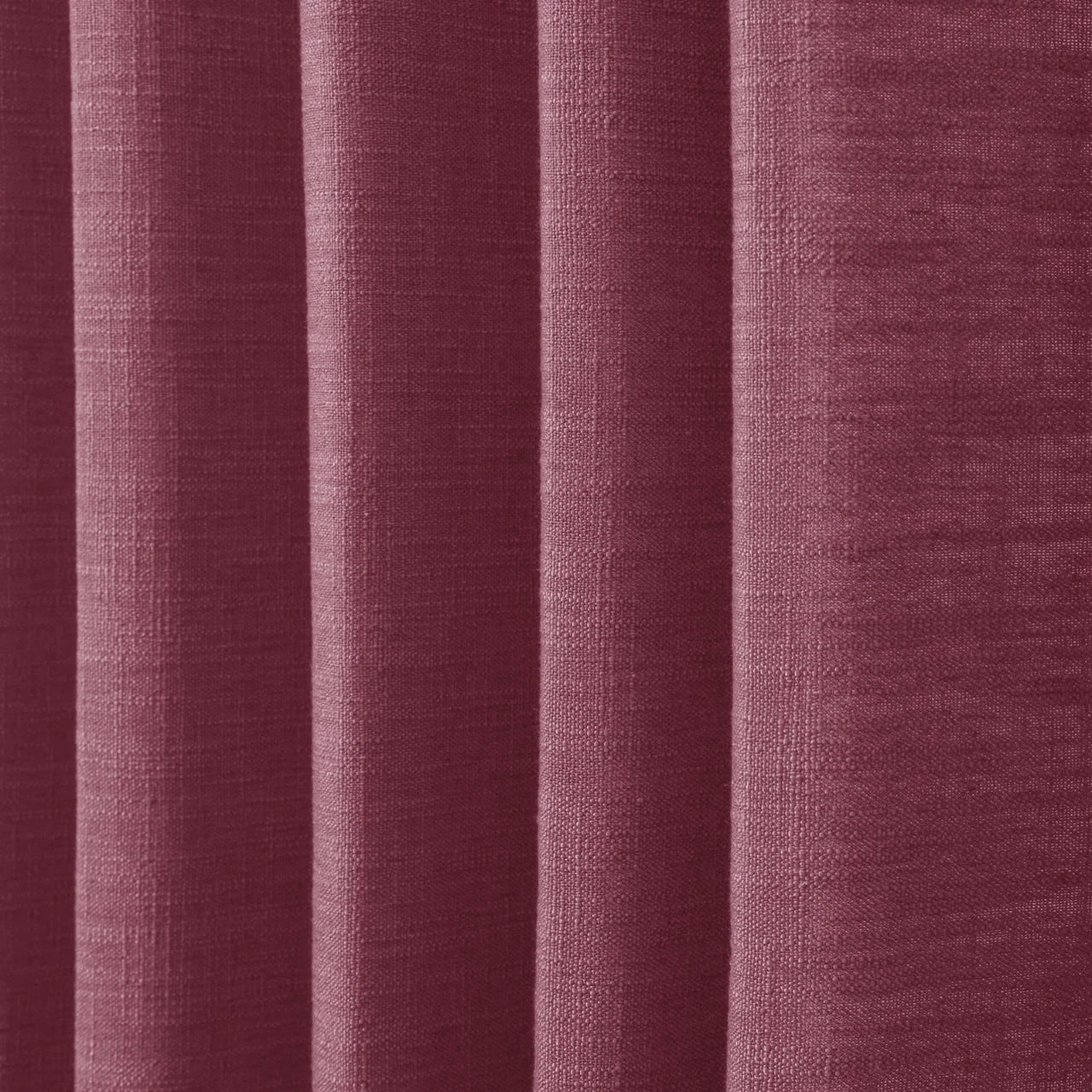 Burgundy Red Liz linen curtains in a close room detail highlighting the linen texture and colour