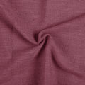 Burgundy Red Liz linen curtains drawn partly across the window with filtered light revealing the weave