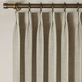 Burlywood Birch Liz Linen Pleated Curtains triple pinch pleat heading on a bronze curtain rod