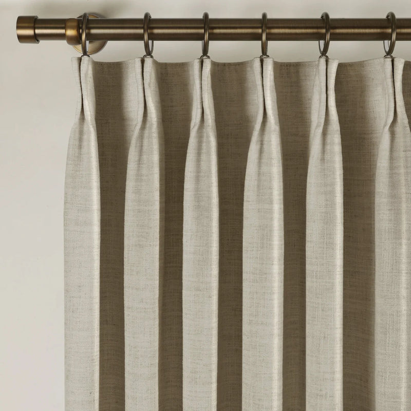 Burlywood Birch Liz Linen Pleated Curtains triple pinch pleat heading on a bronze curtain rod