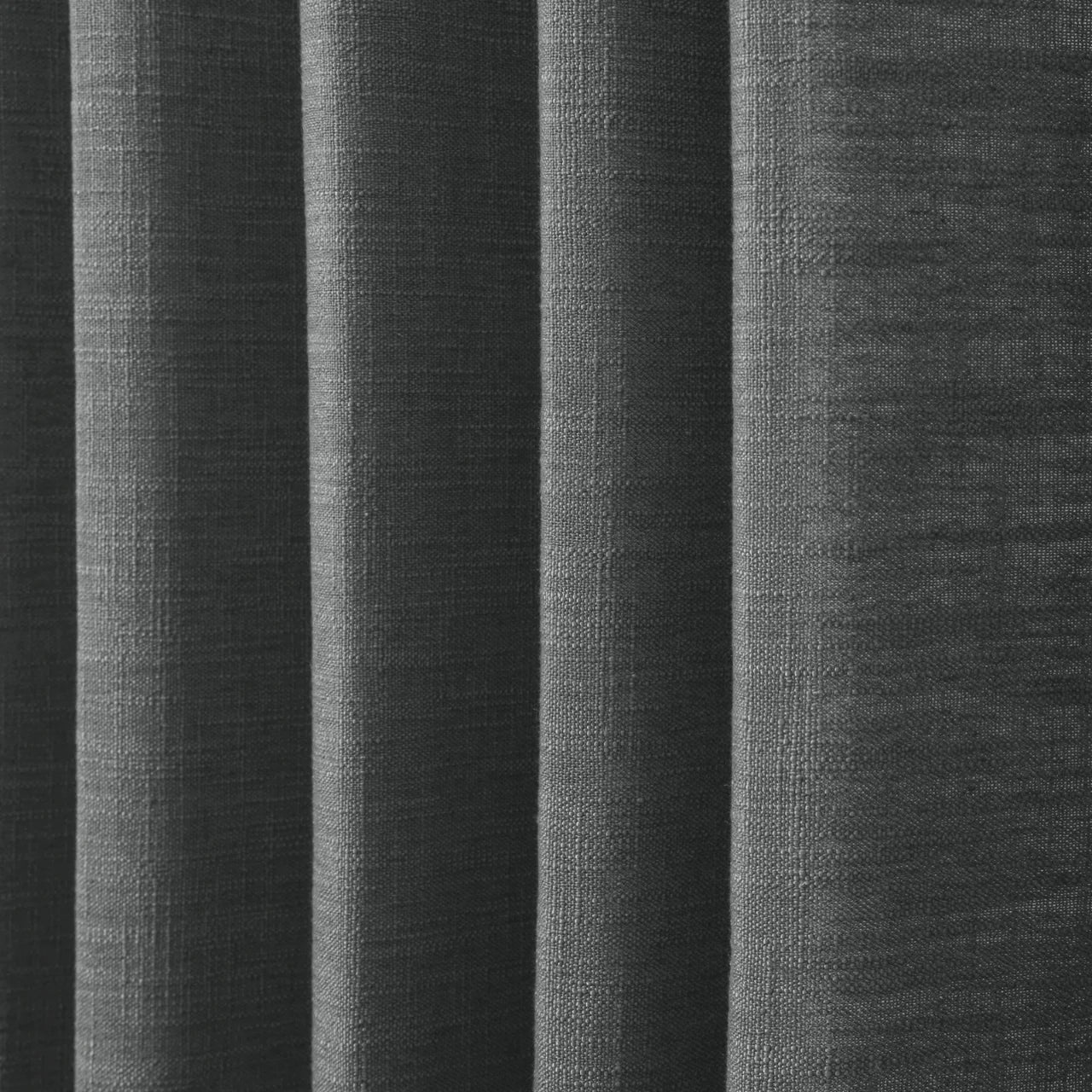 Carbon Grey Liz linen curtains in a close room detail highlighting the linen texture and colour