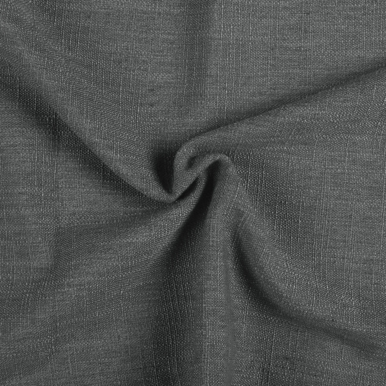 Carbon Grey Liz linen curtains drawn partly across the window with filtered light revealing the weave