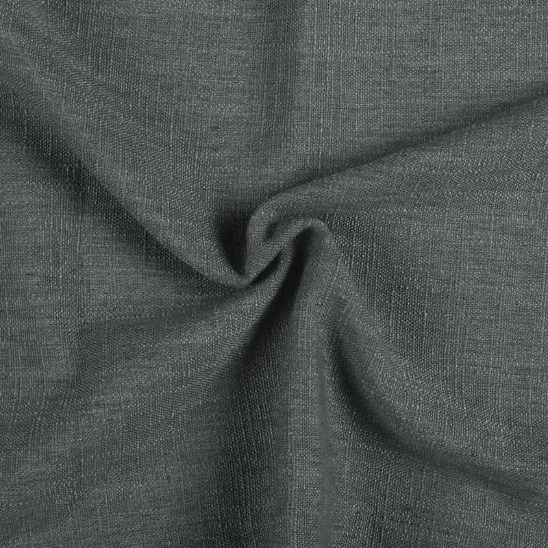 Carbon Grey Liz linen curtains drawn partly across the window with filtered light revealing the weave