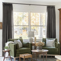 Chocolate Tart Liz linen curtains framing a bright window in a balanced full-length interior view