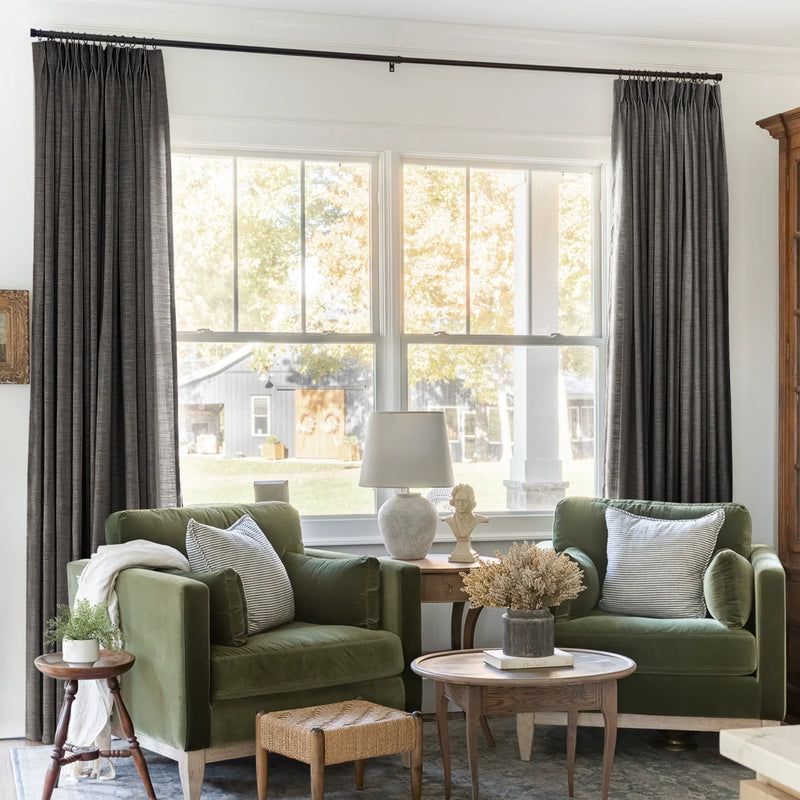 Chocolate Tart Liz linen curtains framing a bright window in a balanced full-length interior view