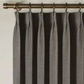 Chocolate Tart Liz linen curtains viewed at an angle in a softly styled room with natural daylight
