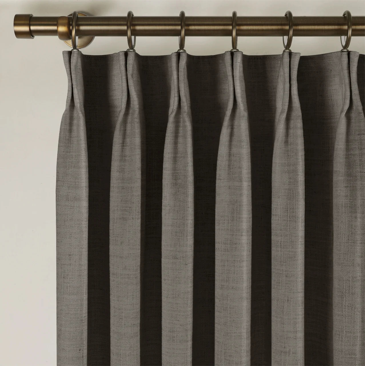 Chocolate Tart Liz linen curtains viewed at an angle in a softly styled room with natural daylight