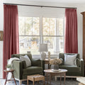 Cinnabar Liz linen curtains framing a bright window in a balanced full-length interior view