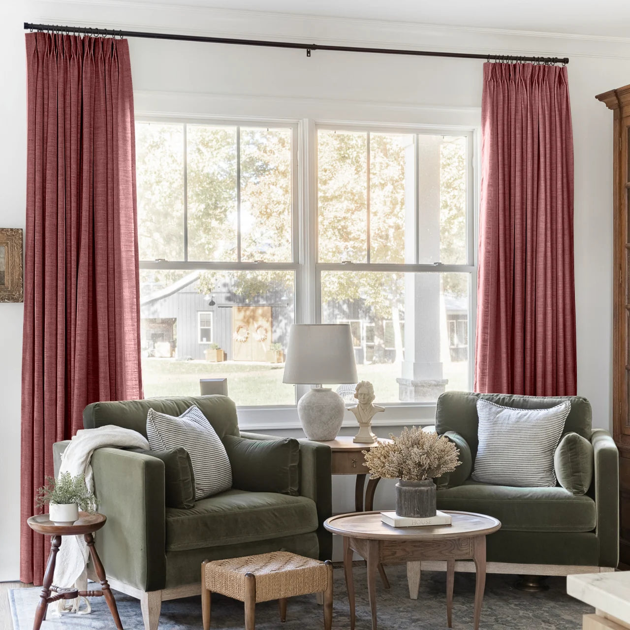 Cinnabar Liz linen curtains framing a bright window in a balanced full-length interior view