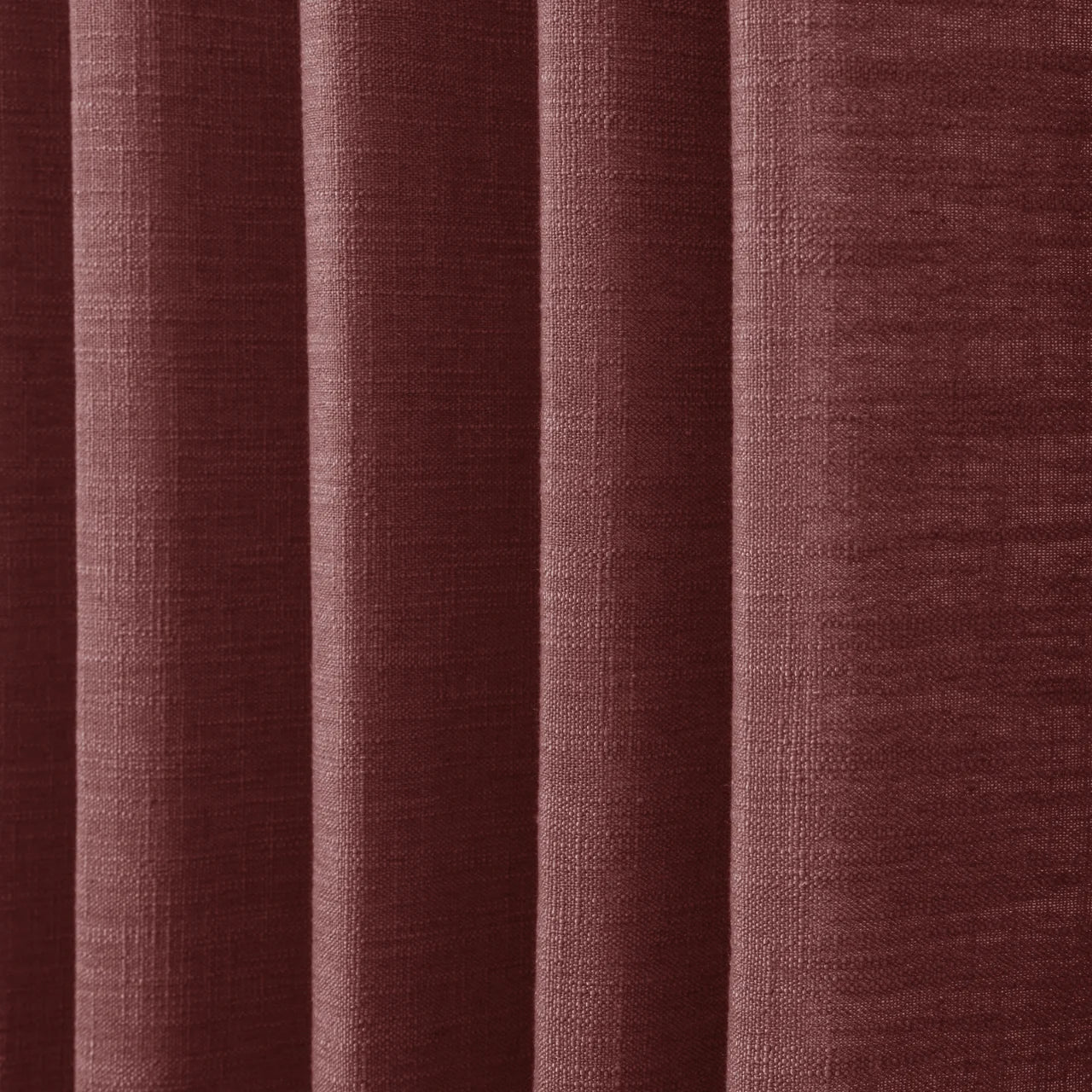 Cinnabar Liz linen curtains in a close room detail highlighting the linen texture and colour