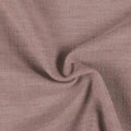Textile image featuring a muted mauve-pink fabric with a visible slubby woven texture and soft undulating folds
