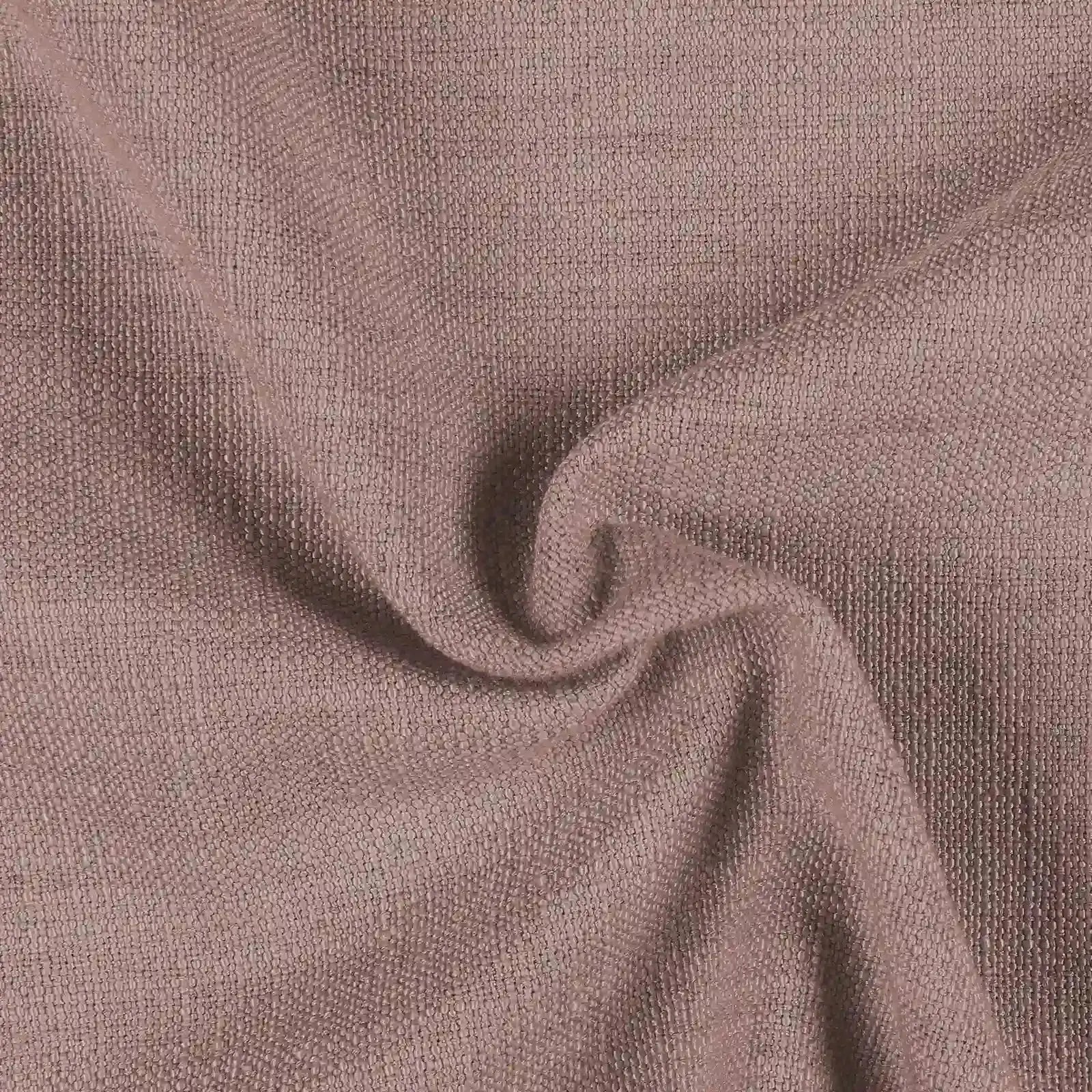 Textile image featuring a muted mauve-pink fabric with a visible slubby woven texture and soft undulating folds