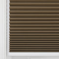 A brown textured pleated cellular window Blind with horizontal pleats installed within a clean white window frame