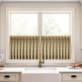 A modern kitchen window with pleated gold plaid cafe curtains on a brass rod above a white farmhouse sink with an ornate brass faucet and a wooden rolling pin on the white counter