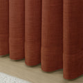 Firebrick Liz linen curtains showing the lower drape and pooling folds near the floor