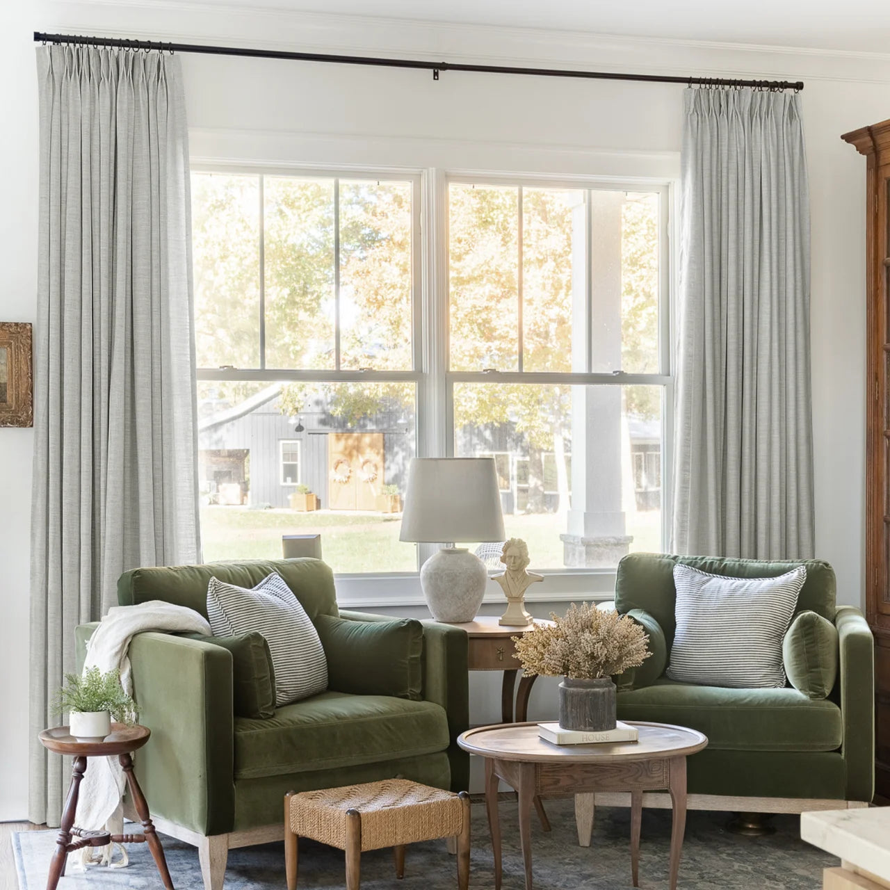 Fog Liz linen curtains framing a bright window in a balanced full-length interior view