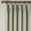 Fog Liz linen curtains showing the lower drape and pooling folds near the floor