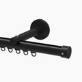 3D render of a modern black ceiling-mounted curtain track system featuring a sleek matte finish, integrated sliders with rings, and a minimalist end cap
