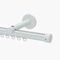 White aluminum curtain track system with integrated gliders, a wall-mounted bracket, and a visible silver fixing screw